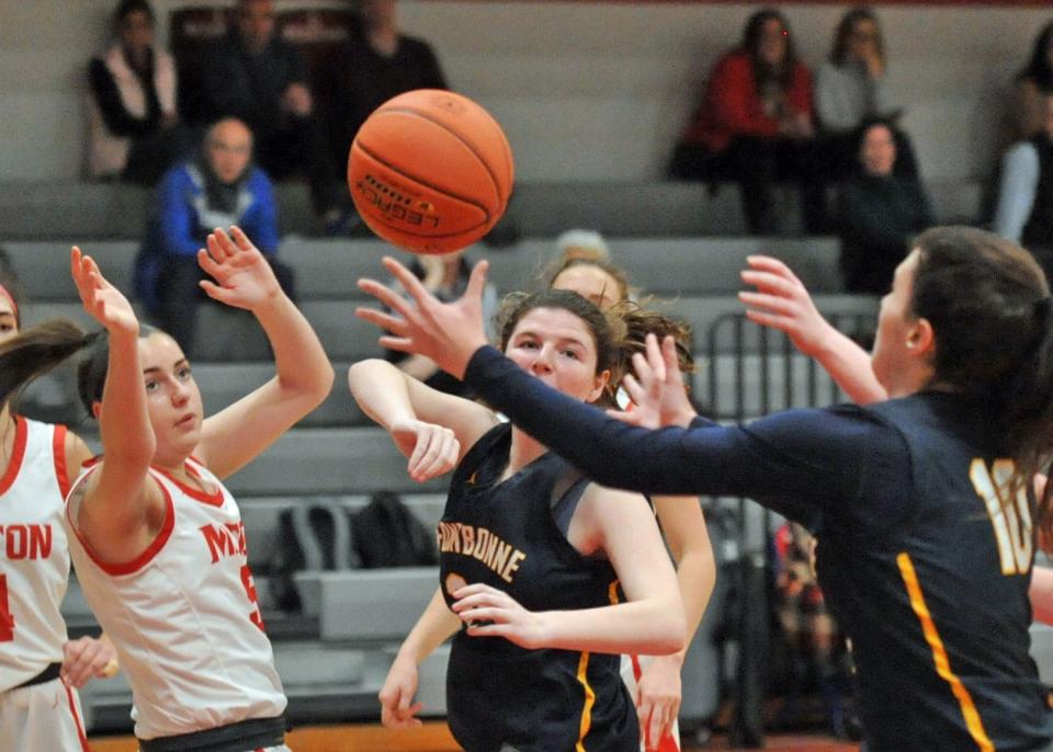 Fontbonne Academy's Lilly Blow, right, prepares to intercept the pass from Miton's Grace Henry, left, during girls basketball action at Milton High School, Thursday, Jan. 12, 2023.