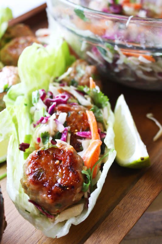The Garlic Diaries<p>These Thai meatball lettuce wraps are bursting with flavor and perfect for any celebration!</p><p><strong>Get the recipe: <a href="https://www.thegarlicdiaries.com/thai-meatball-lettuce-wraps/" rel="sponsored" target="_blank" data-ylk="slk:Thai Lettuce Meatball Wraps;elm:context_link;itc:0;sec:content-canvas" class="link "><em>Thai Lettuce Meatball Wraps</em></a></strong></p>