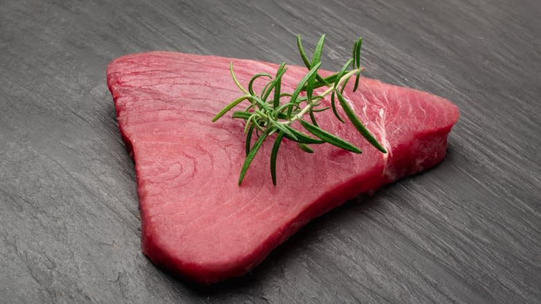 raw tuna steak with rosemary