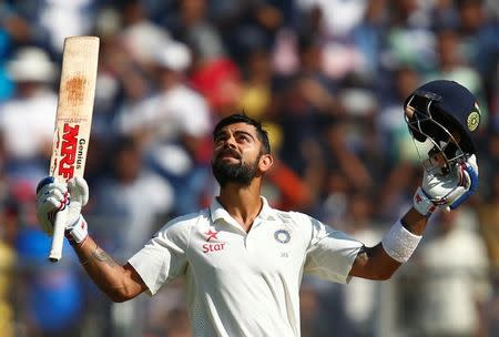 Cricket - India v England - Fourth Test cricket match - Wankhede Stadium, Mumbai, India - 11/12/16. India's Virat Kohli celebrates his double century. REUTERS/Danish Siddiqui