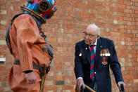 EMBARGOED TO 0001 FRIDAY SEPTEMBER 25 Captain Sir Tom Moore in Wootton, Marston Moretaine, Bedford with veteran fundraiser Lloyd Scott, who will attempt to climb the Three Peaks whilst wearing a deep sea diving suit.