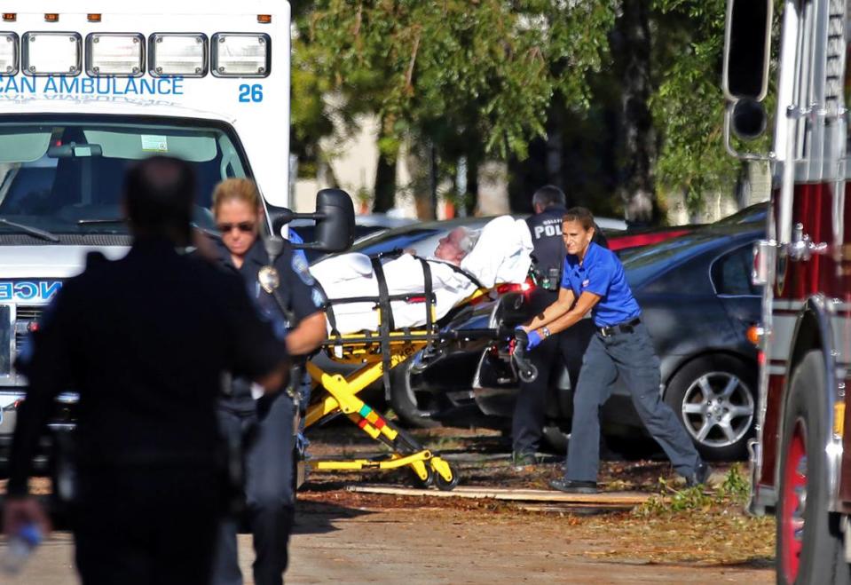 A file photo shows a woman being transported from The Rehabilitation Center at Hollywood Hills as patients were evacuated after a loss of air conditioning due to Hurricane Irma on Wednesday, Sept. 13, 2017, in Hollywood.