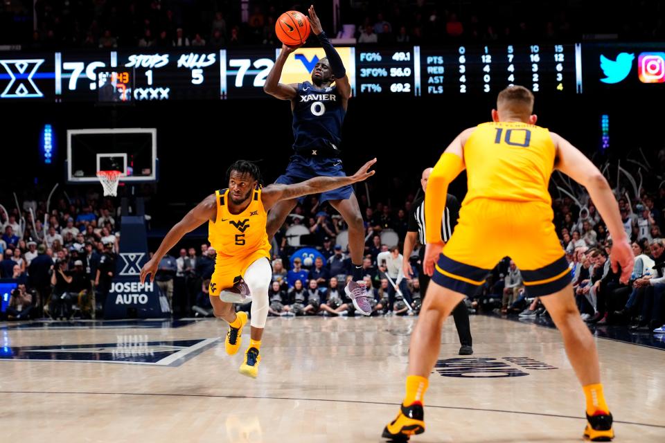 Xavier guard Souley Boum  scored nine of his game-high 23 points in the final four minutes and also scored his 2,000th career point Saturday night..