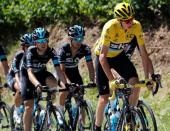 Cycling - Tour de France cycling race - The 209 km (129.8 miles) Stage 16 from Moirans-en-Montagne, France to Berne, Switzerland - 18/07/2016 - Yellow jersey leader Team Sky rider Chris Froome of Britain cycles with team mates during the stage. REUTERS/Jean-Paul Pelissier