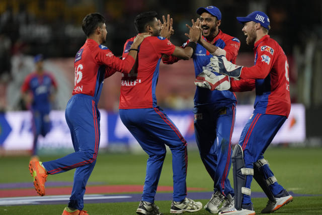 Delhi Capitals' Khaleel Ahmed, second left, celebrates with teammates after taking the catch to dismiss Punjab Kings' Jitesh Sharma during the Indian Premier League cricket match between Punjab Kings and Delhi Capitals in Dharamshala, India, Wednesday, May 17, 2023. (AP Photo/Ashwini Bhatia)