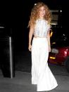 <p>Lady Gaga wore crop top with high-waisted trousers as she left the recording studio in New York, August 2013. </p>