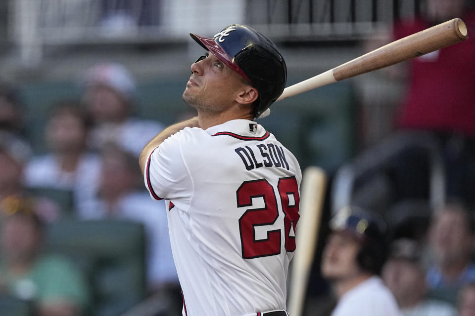 Atlanta Braves' Matt Olson drives in a run with a sacrifice fly in the first inning of a baseball game against the Los Angeles Angels Tuesday, Aug. 1, 2023, in Atlanta. (AP Photo/John Bazemore)