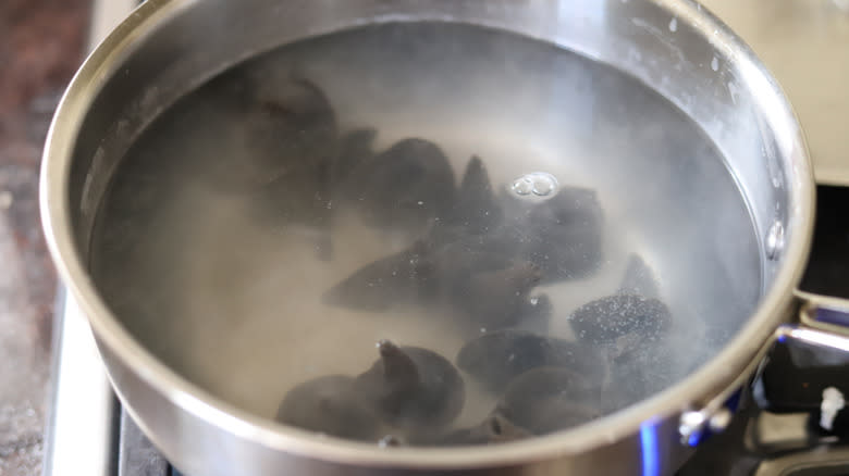 cooked witch hat pasta in boiling water