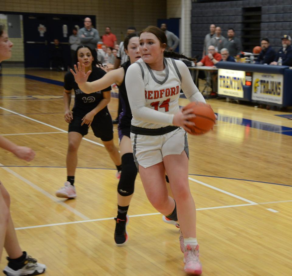 Nyah Mullins takes the ball to the basket against Woodhaven Wednesday during a 48-27 Beford win in the semifinals of the Division 1 District at Trenton.