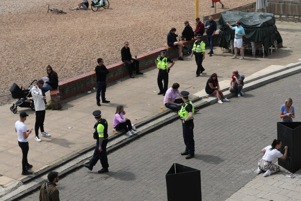 Police on Brighton beach after the introduction of measures to bring the country out of lockdown.