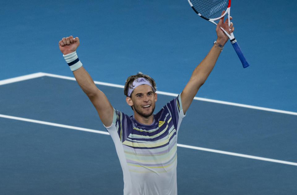 MELBOURNE, AUSTRALIA - JANUARY 31: Dominic Thiem of Austria celebrates his victory in his semi-final match against Alexander Zverev of Germany on day twelve of the 2020 Australian Open at Melbourne Park on January 31, 2020 in Melbourne, Australia. (Photo by TPN/Getty Images)