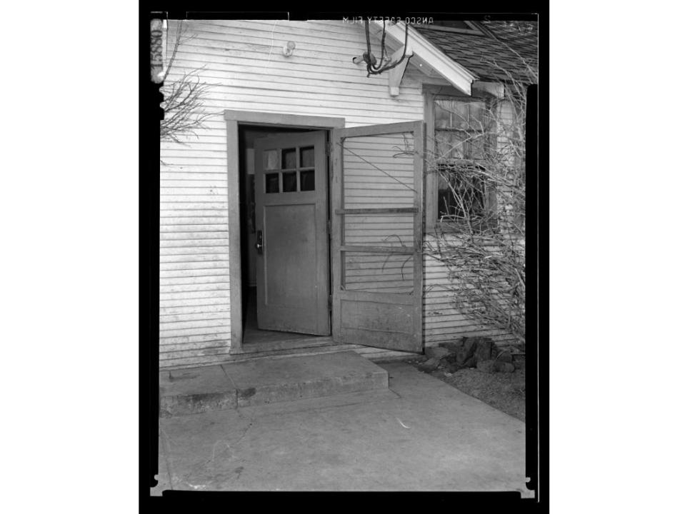 A black and white picture shows a door entrance to the Utah State Training School, where many sterilizations of people thought at the time to be "feeble-minded" took place in Utah.