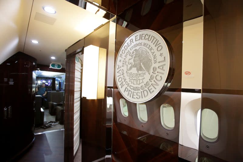 FILE PHOTO: Mexico's official government seal is seen on a wall of the Mexican Air Force Presidential Boeing 787-8 Dreamliner during a media tour before is put up for sale by Mexico's new President, at Benito Juarez International Airport in Mexico City
