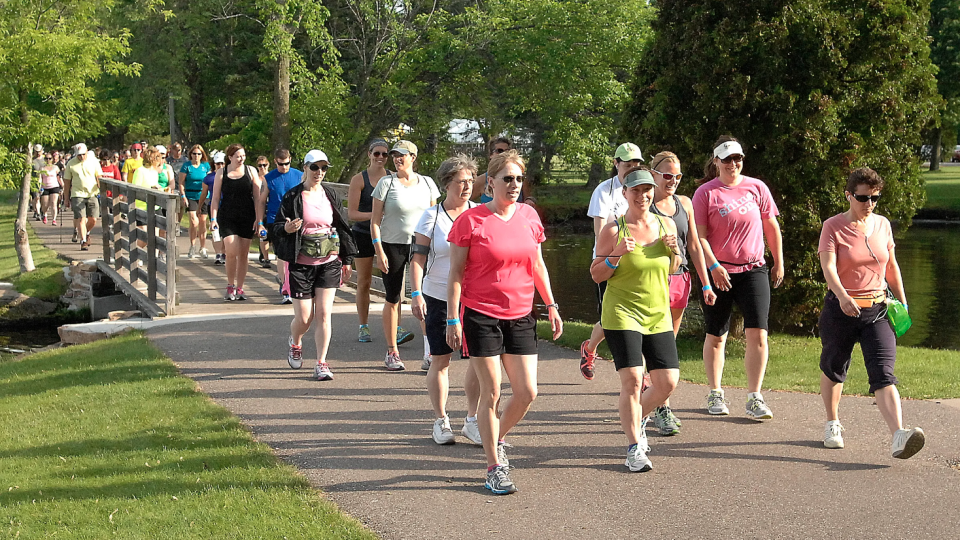 Walkers stroll along the paved Green Circle Trail, which loops for about 30 miles around Stevens Point.