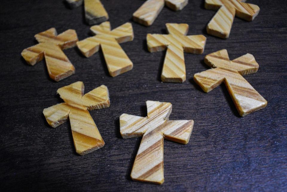 Tony Picciuto began making pocketsize wooden crosses when he was 88 years old.