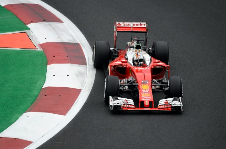 Scuderia Ferrari German driver Sebastian Vettel drives during the Formula One Mexico Grand Prix practice session at the Hermanos Rodriguez circuit in Mexico City on October 28, 2016