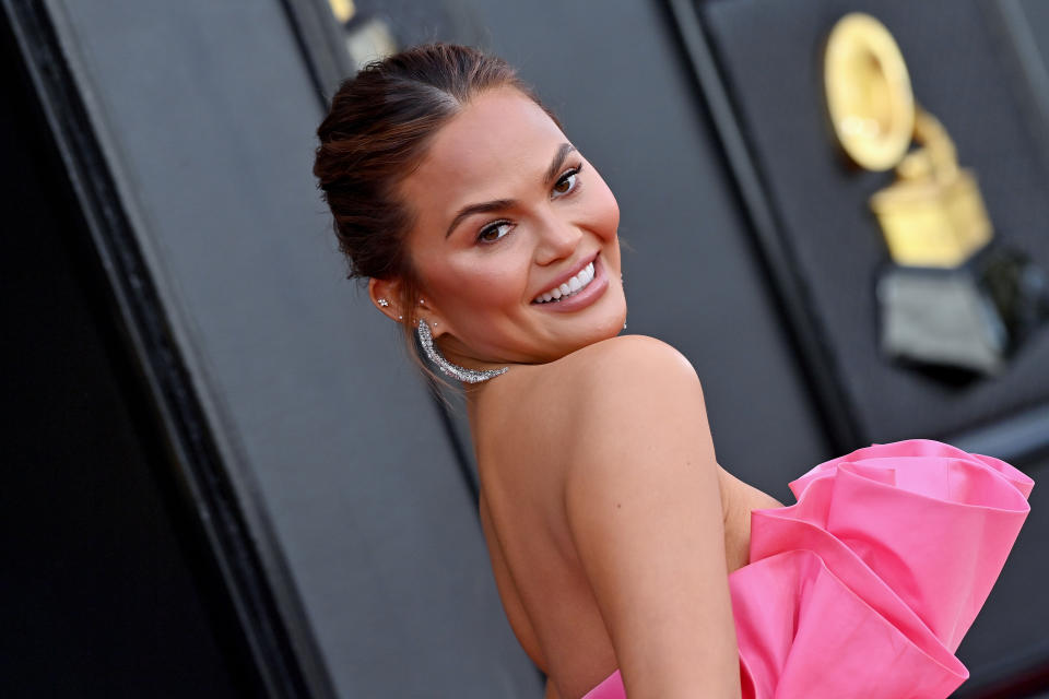 LAS VEGAS, NEVADA - APRIL 03: Chrissy Teigen attends the 64th Annual GRAMMY Awards at MGM Grand Garden Arena on April 03, 2022 in Las Vegas, Nevada. (Photo by Axelle/Bauer-Griffin/FilmMagic)