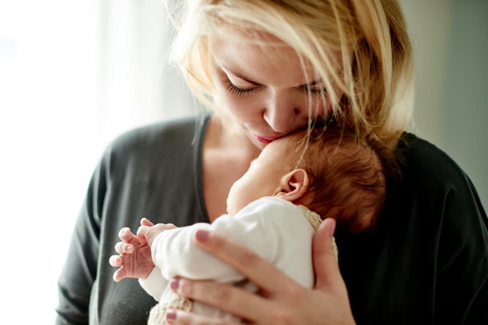 Give a worn item of clothing to you dog before bringing baby home. Photo: Getty