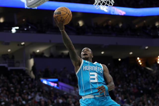 MILWAUKEE, WISCONSIN - JANUARY 06: Terry Rozier #3 of the Charlotte Hornets takes a shot during the second half of a game against the Milwaukee Bucks at Fiserv Forum on January 06, 2023 in Milwaukee, Wisconsin. NOTE TO USER: User expressly acknowledges and agrees that, by downloading and or using this photograph, User is consenting to the terms and conditions of the Getty Images License Agreement. (Photo by Stacy Revere/Getty Images)