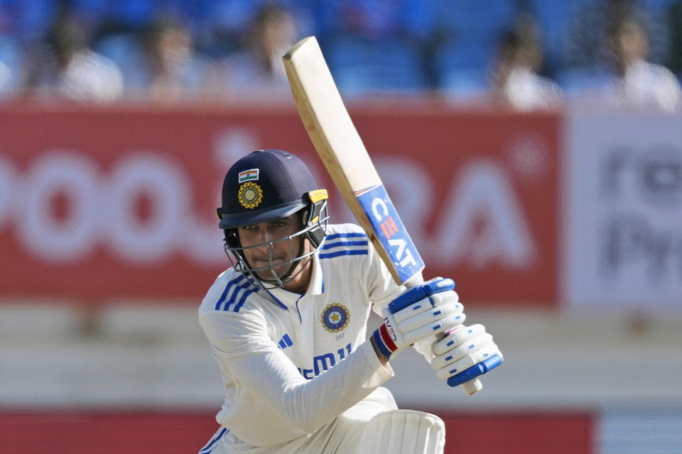 India's Shubman Gill plays a shot on the fourth day of the third cricket test match between England and India in Rajkot, India, Sunday, Feb. 18, 2024. (AP Photo/Ajit Solanki)