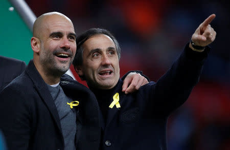Soccer Football - Carabao Cup Final - Arsenal vs Manchester City - Wembley Stadium, London, Britain - February 25, 2018 Manchester City manager Pep Guardiola celebrates after winning the Carabao Cup Action Images via Reuters/Carl Recine