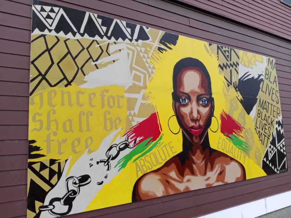The mural "Absolute Equality" was created in honor of Juneteenth in 2021. It can be found on the outside of Opportunities Credit Union at 92 North Avenue.