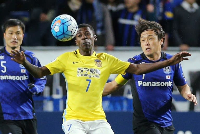 Brazilian midfielder Ramires (centre) in action for Jiangsu Suning during their AFC Champions League match against Gamba Osaka at Suita City stadium on March 15, 2017. Jiangsu won 1-0