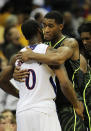 KANSAS CITY, MO - MARCH 09: Perry Jones III #1 of the Baylor Bears and Thomas Robinson #0 of the Kansas Jayhawks embrace after the Bears defeated the Jayhawks 81 to 72 during the semifinals of the 2012 Big 12 Men's Basketball Tournament at Sprint Center on March 9, 2012 in Kansas City, Missouri. (Photo by Jamie Squire/Getty Images)