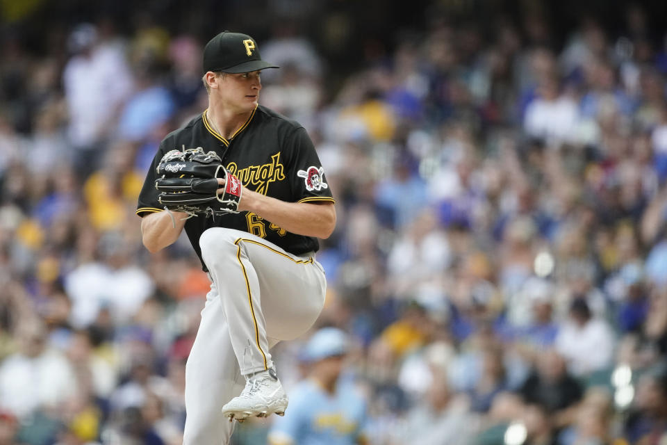 Pittsburgh Pirates' Quinn Priester pitches during the first inning of a baseball game against the Milwaukee Brewers, Friday, Aug. 4, 2023, in Milwaukee. (AP Photo/Aaron Gash)