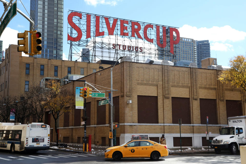 Traffic passes Silvercup Studios, a film and television production facility, located in Long Island City near the site for a proposed Amazon headquarters in the Queens borough of New York, Friday, Nov. 16, 2018. While some residents are optimistic about Amazon moving into their neighborhood, others have doubts about whether they will be able to get any of the thousands of jobs the company is promising to bring to the area. (AP Photo/Mark Lennihan)