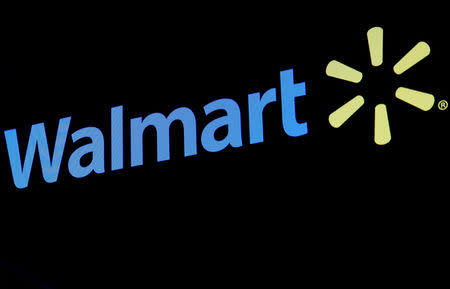 FILE PHOTO: The Walmart logo is displayed on a screen on the floor of the New York Stock Exchange (NYSE) in New York, U.S., May 1, 2018. REUTERS/Brendan McDermid/File Photo