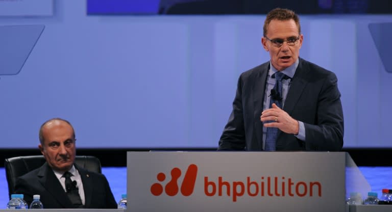 BHP Billiton Chairman Jac Nasser (L) listens as chief executive Andrew Mackenzie speaks at the company's annual general meeting in Perth, in 2015