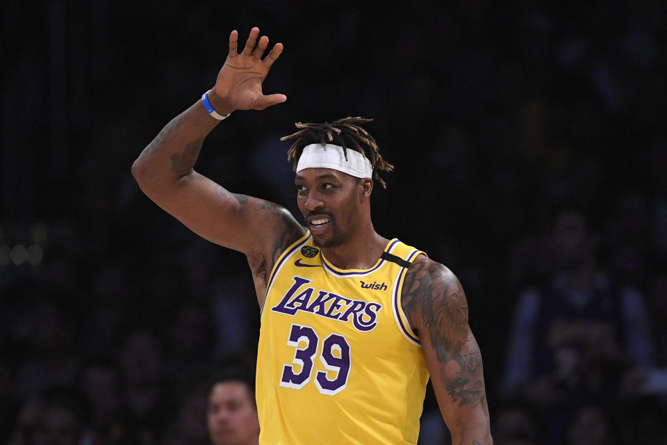 Los Angeles Lakers center Dwight Howard gestures during the first half of an NBA basketball game against the Philadelphia 76ers Tuesday, March 3, 2020, in Los Angeles. (AP Photo/Mark J. Terrill)