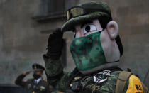 An army mascot salutes during the annual Independence Day military parade in Mexico City's main square of the capital, the Zócalo, Wednesday, Sept. 16, 2020. Mexico celebrates the anniversary of its independence uprising of 1810. (AP Photo/Marco Ugarte)