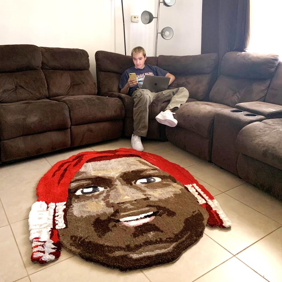 A custom rug of Lil Yachty's face.