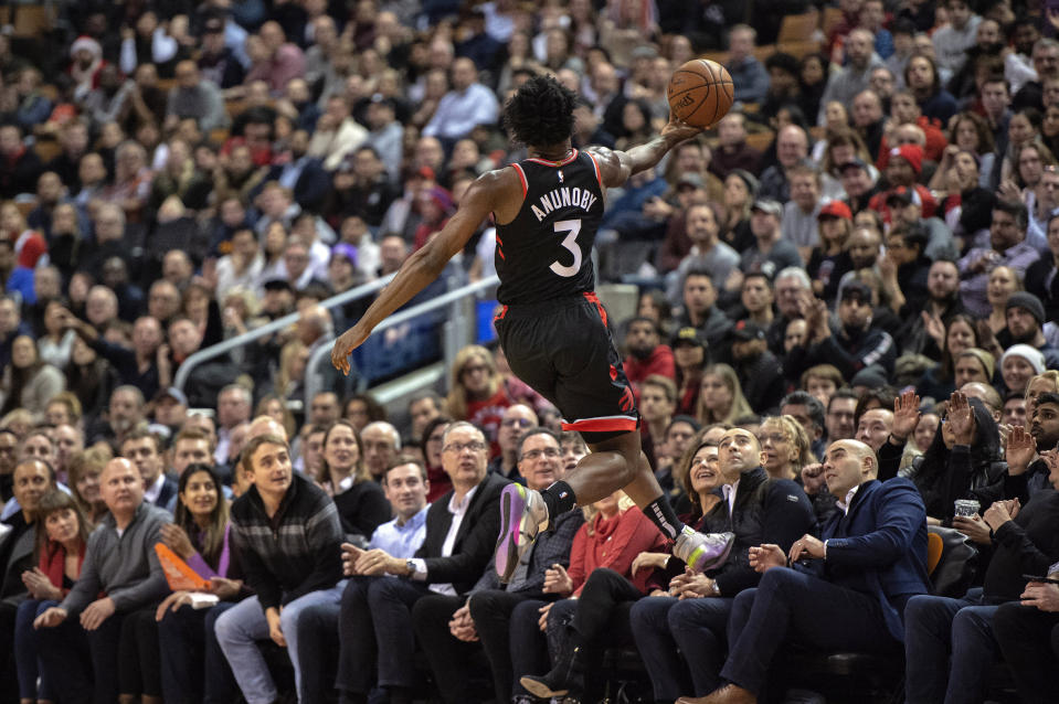 Toronto Raptors forward OG Anunoby (3) recovers the ball about to go out of bounds during the first half of the team's NBA basketball game against the Washington Wizards on Friday, Dec. 20, 2019, in Toronto. (Frank Gunn/The Canadian Press via AP)