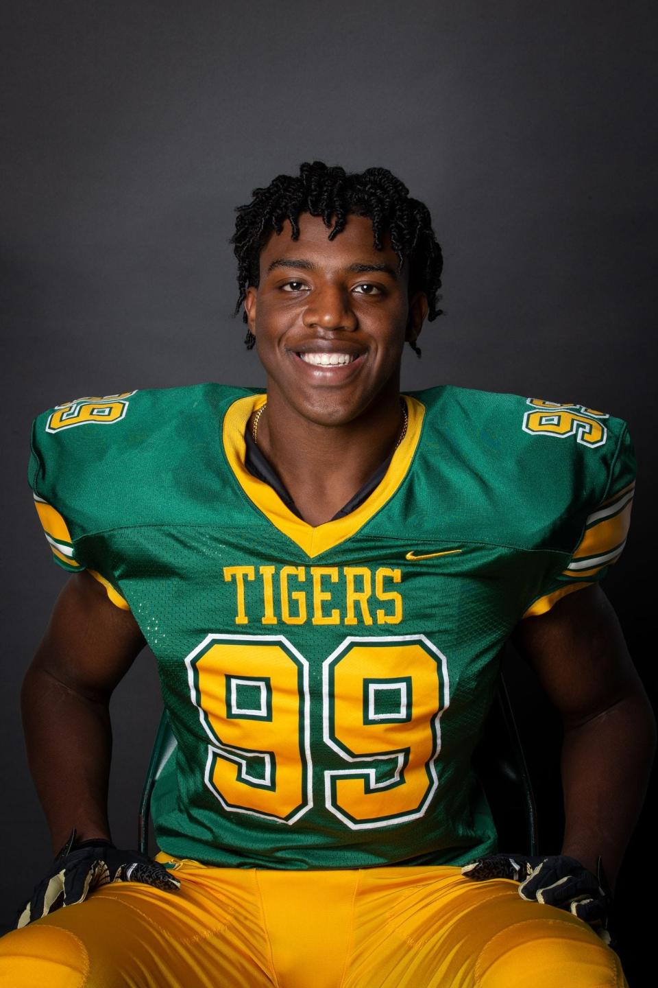 St. Xavier High School's Micah Carter has been named to The Courier Journal's All-State football first team.