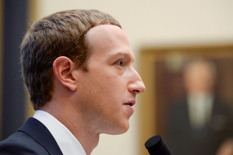 FILE PHOTO: FILE PHOTO: Facebook Chairman and CEO Zuckerberg testifies at a House Financial Services Committee hearing in Washington