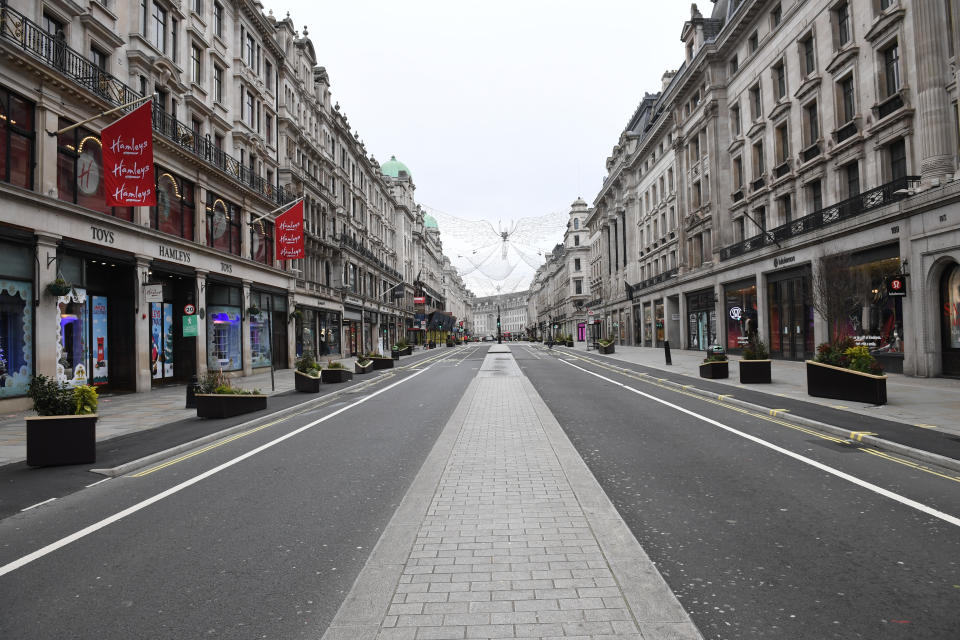 Regent Street in London stands empty during what would normally be the Boxing Day sales. Boxing Day spending is expected to fall by more than a quarter compared with a year ago, after extensive new Covid-19 restrictions forced non-essential retailers to close. (Photo by Stefan Rousseau/PA Images via Getty Images)