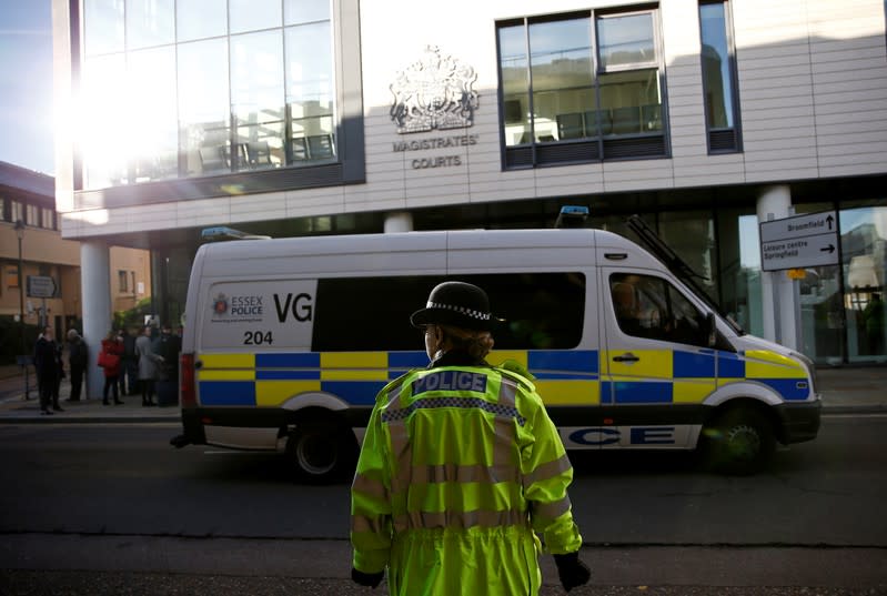 A police officer stands outside Chelmsford Magistrates' Court