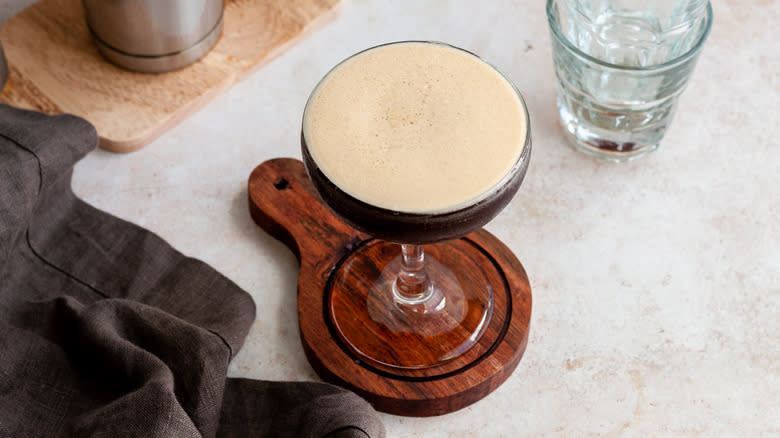 foamy espresso martini in glass