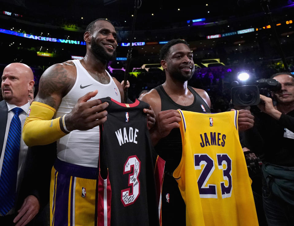 LeBron James and Dwyane Wade exchanged jerseys after their final meeting Monday night. (Getty)