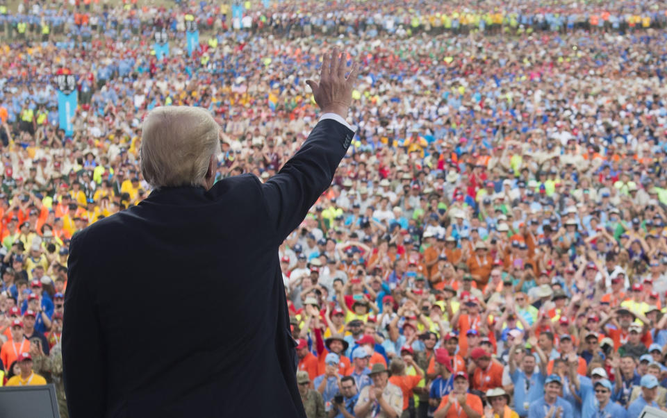 President Donald Trump waves after speaking to Boy Scouts during the National Boy Scout Jamboree on July 24, 2017.