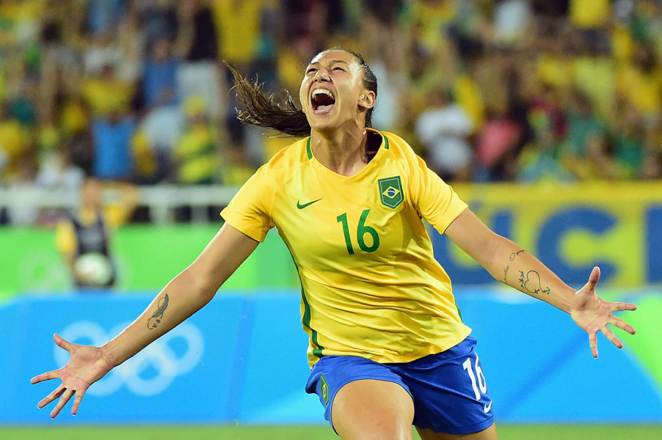 <p>Beatriz of Brazil celebrates her goal during the Women’s Group E first round match between Brazil and Sweden on Day 1 of the Rio 2016 Olympic Games at the Olympic Stadium on August 6, 2016 in Rio de Janeiro, Brazil. (Photo by Harry How/Getty Images) </p>