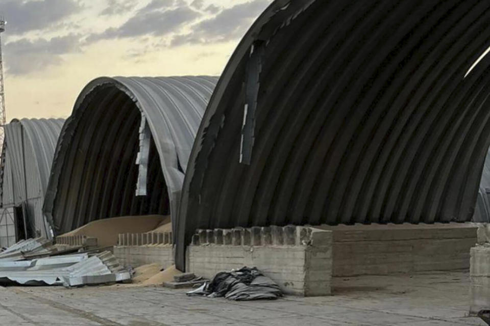 In this photo provided by the Odesa Regional Administration Press Office, a granary destroyed in a Russian drone attack at night is seen in a Danube port near Odesa, Ukraine, early hours Wednesday, Aug. 16, 2023. (Odesa Regional Administration Press Office via AP)