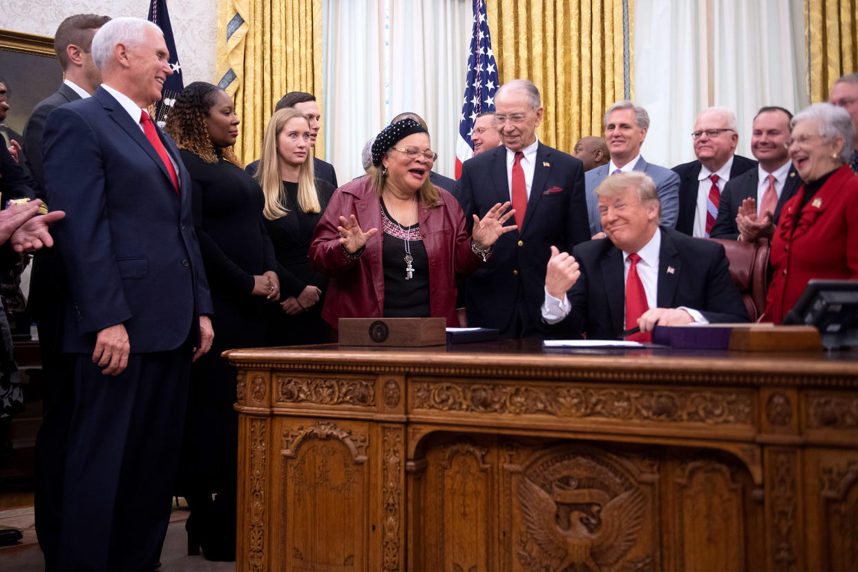 Image: Donald Trump signs the First Step Act at the White House in 2018 (Jim Watson / AFP via Getty Images file)