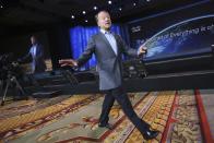 Cisco CEO John Chambers walks the floor while delivering his keynote speech at the annual Consumer Electronics Show (CES) in Las Vegas, Nevada January 7, 2014. REUTERS/Robert Galbraith (UNITED STATES - Tags: BUSINESS SCIENCE TECHNOLOGY)