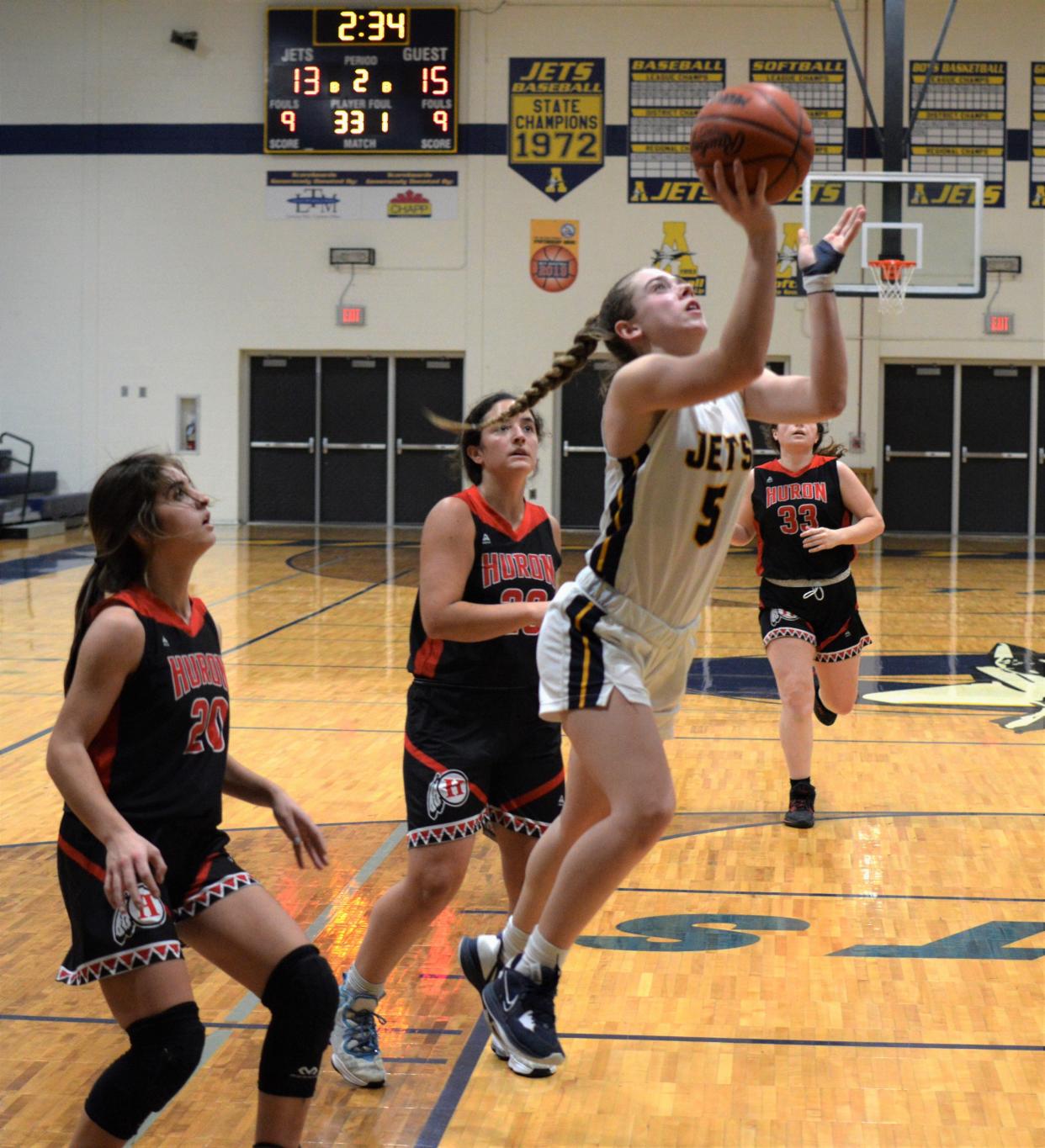 Airport's Payton Zajac goes up for a shot against New Boston Huron on Monday, Jan. 23, 2023.