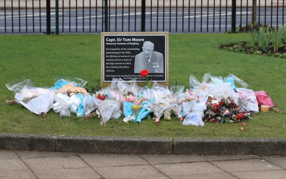 A memorial plaque in Keighley, West Yorkshire, on the day of Captain Sir Tom Moore's funeral - Danny Lawson/PA