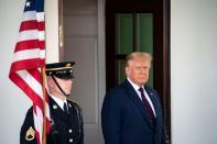 U.S. President Donald Trump welcomes Bahrain's Foreign Minister Abdullatif bin Rashid Al Zayani at the White House